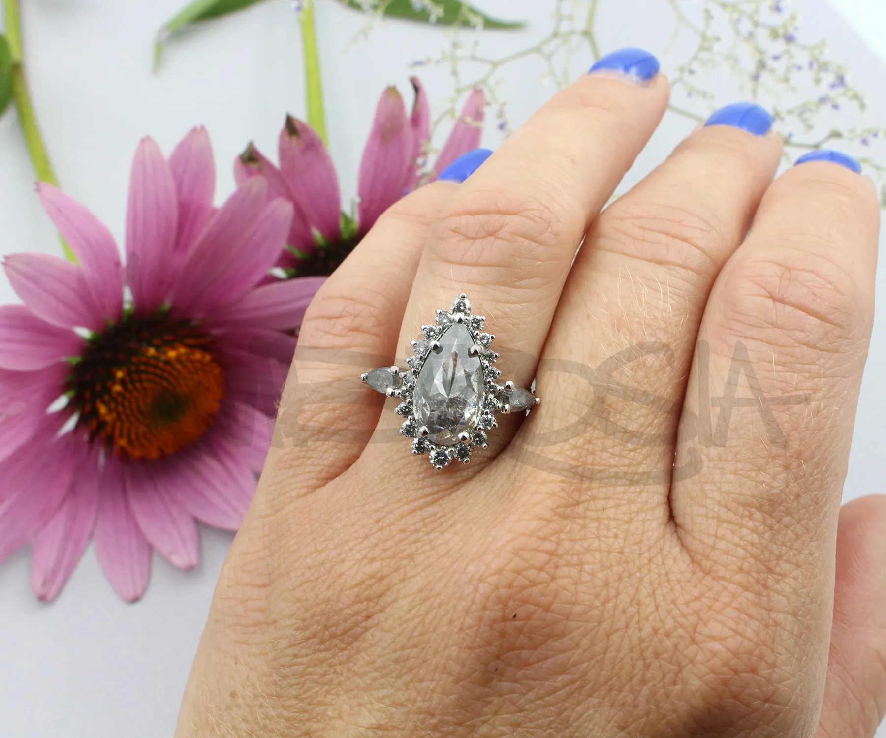 Stunning Pepper Pear Diamond Halo Engagement Ring